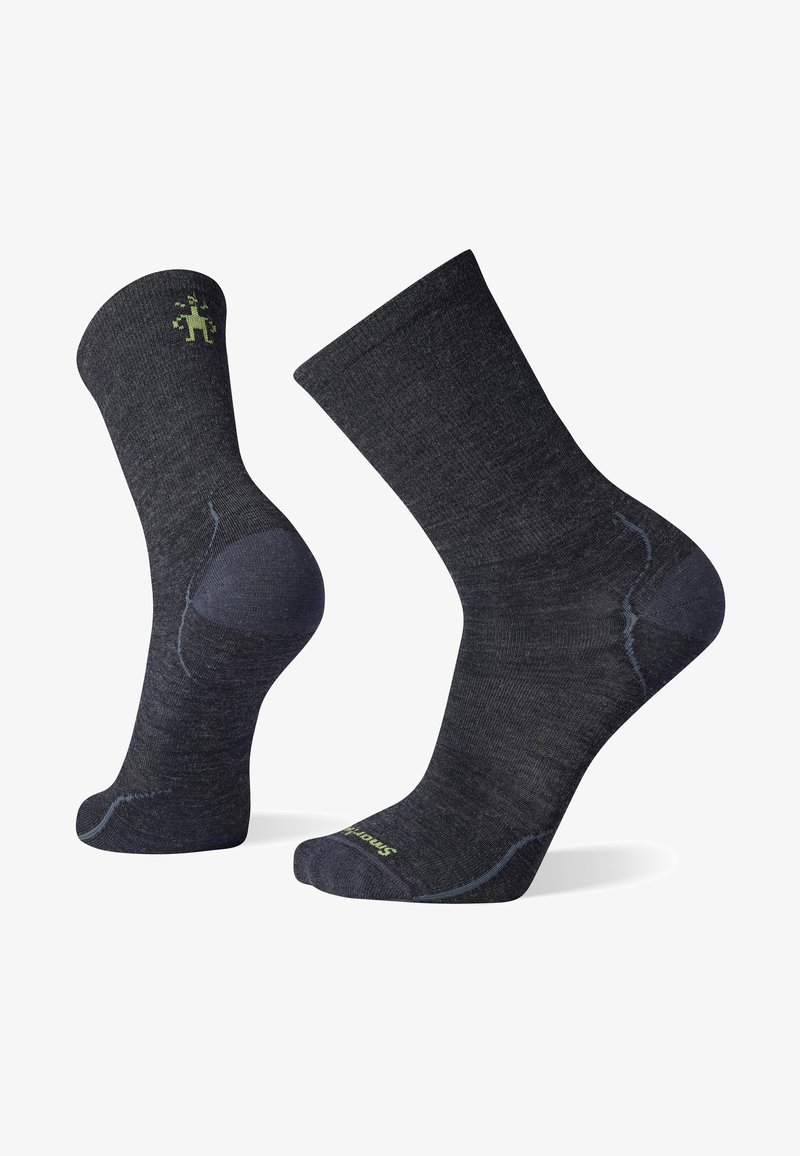 Dark grey socks with a subtle blue accent, reinforced heel and toe, and a green logo on the cuff design. Made from a soft, textured material.