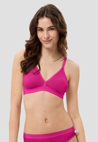 Rosa drahtlose Bralette mit verstellbaren Trägern, dreieckiger Form, glatter Textur und einem markierten Bund unter der Brust.