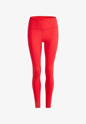 Red high-waist seamless fitted leggings with flat seams, extending to the ankles, designed for activewear or casual use.