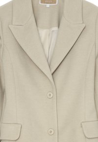 Blazer da donna in beige con texture, colletto a punte, due bottoni, tasche a patta e foderato in crema, etichettato taglia 12 da KOCCA.