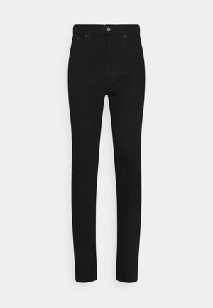 Jeans skinny de mezclilla negra con cintura alta, con cierre de botón en la parte delantera y cinco bolsillos. Textura suave y ajuste entallado.
