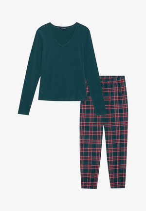 Long-sleeve dark teal V-neck top paired with green, red, and navy blue plaid elastic-waist pants.