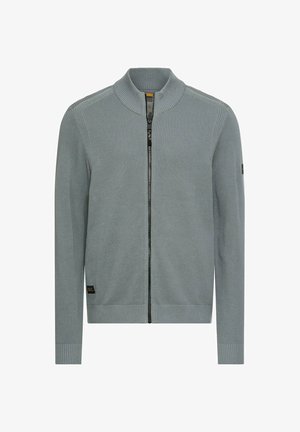 Lichtgrijze sweater met ritssluiting, voorzien van een gestructureerd breiwerk, geribbelde manchetten en een kraag. Beschikt over een contrasterende zwarte rits en een labeldetail.