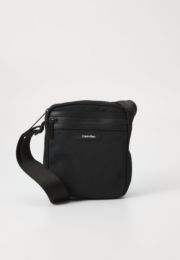 ESSENTIAL REPORTER - Umhängetasche