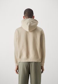 Redefined Rebel Hoodie - string