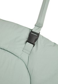 Light green padded bag with adjustable strap and a black plastic buckle. The fabric is smooth with subtle stitching details.