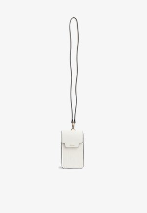 White leather phone pouch with a flap closure and embossed cactus design. Features black edge stitching and a long black strap with clasps.