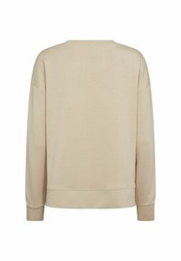 Bež hoodie dugih rukava opuštenog kroja, s okruglim izrezom i rebrastim manžetama. Glatka tkanina s minimalnim šavovima i detaljima.
