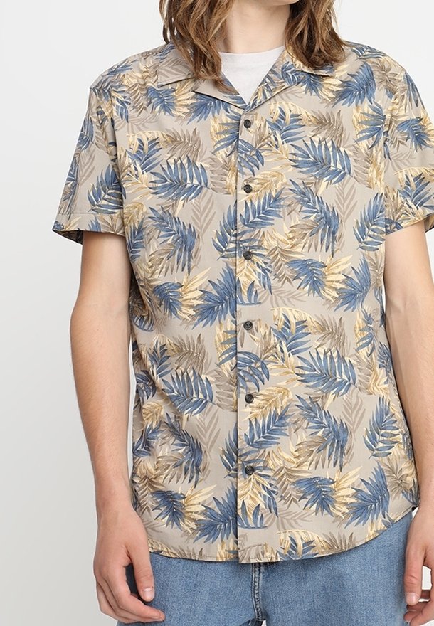 Short-sleeve, button-up shirt in beige with blue and brown leaf patterns. Made from lightweight fabric, featuring a classic collar and front pockets.