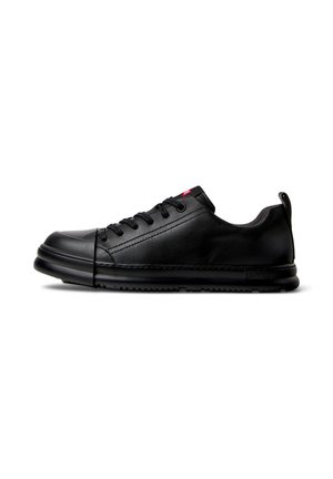 Black sneakers featuring a smooth leather upper, lace closure, and rubber sole, presented side-on against a white background.
