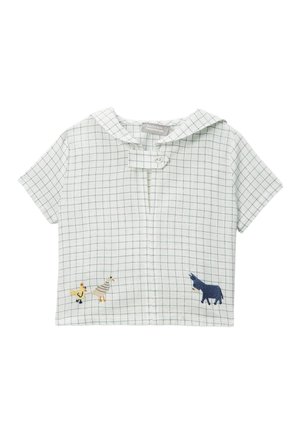 Chemise courte blanche pour tout-petit avec motif à carreaux gris, col marin, devant boutonné et poussins jaunes brodés ainsi qu'un âne bleu.