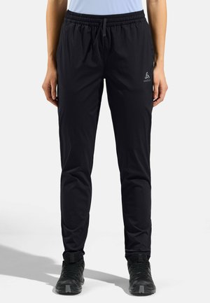 ESSENTIAL - Tracksuit bottoms - black