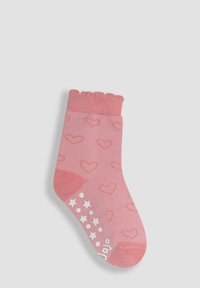 Calcetín rosa de algodón con patrones de corazones, borde superior con diseño ondulado y patrón de estrellas blancas y puntos antideslizantes en la suela. Textura suave, diseño hasta el tobillo.