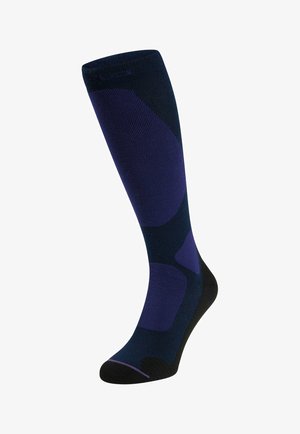 Knee-high sock with black and dark blue color blocks, designed for support and comfort, shown upright on a white background.