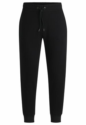 Zwarte joggingsbroeken van zacht materiaal, met een elastische tailleband met verstelbare koorden en geribde boorden bij de enkels.
