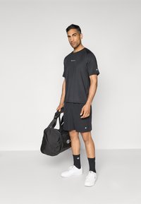 Champion TRAINING SHORTS - Calções desportivos - black