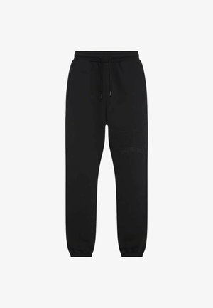 Pantaloni da jogging neri con vita elasticizzata, coulisse, tasche laterali, orli risvoltati e logo in rilievo sottile sulla coscia destra.
