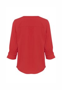 Rode blouse met een ronde halslijn, driekwart mouwen met elastische manchetten en een plooidetail aan de achterkant. Zacht, lichtgewicht materiaal.