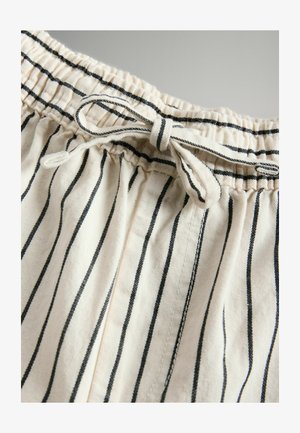 Lekkie bawełniane szorty w kolorze kremowym z cienkimi czarnymi paskami, z elastycznym pasem w talii i wiązaniem z przodu.