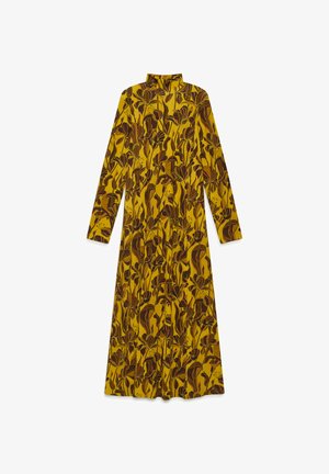 Abito a maniche lunghe con collo alla coreana, realizzato in tessuto morbido, caratterizzato da uno sfondo giallo con motivi floreali marroni su tutta la superficie.