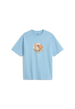 Light blue cotton t-shirt featuring a graphic print of a cake with "VANS" text in red. Short sleeves and a classic crew neckline.