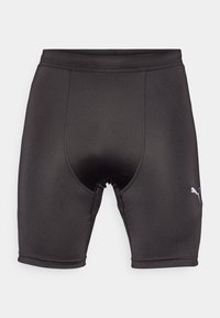 Čierne športové šortky vyrobené z hladkého, elastického materiálu. Majú priliehavý strih, zosilnené švy a malé biele logo na dolnej ľavej strane.
