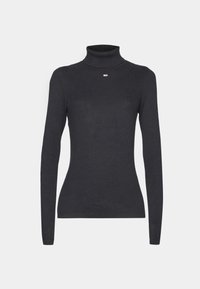 Maglione a maniche lunghe con collo alto e costine nere, caratterizzato da una silhouette aderente e un piccolo logo sul petto. Tessuto elasticizzato con una superficie liscia.