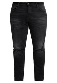 Svarta jeans i denim, figurnära design, med slitna detaljer vid knäna, fem-ficks stil och klassisk knäppning.