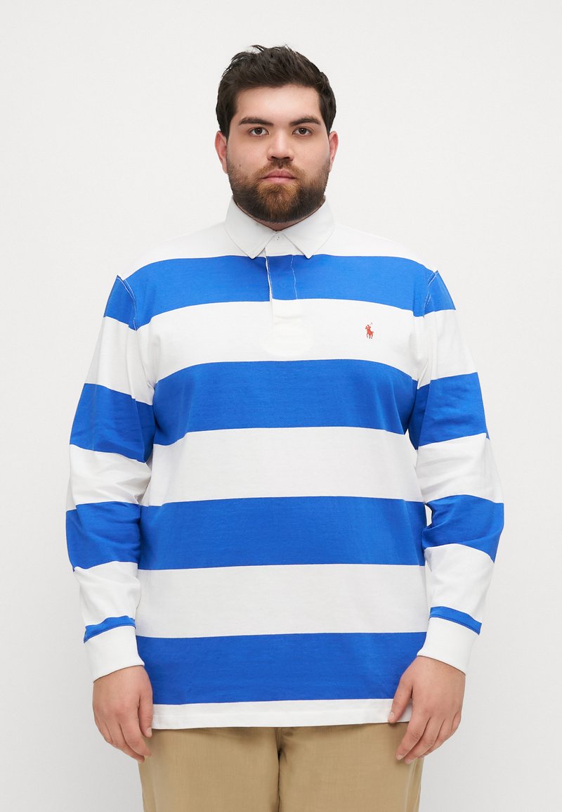 Langermet polo-skjorte med horisontale blå og hvite striper, krage og en liten rød logo på brystet. Myk bomullsstoff.