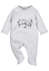 Witte katoenen babyoverall met lange mouwen en drukknoopsluitingen. Voorzien van een olifantenafbeelding en tropische bladeren met de tekst "safari avontuur".