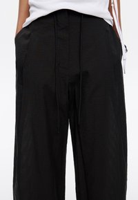 Bimba Y Lola Auduma bikses - black