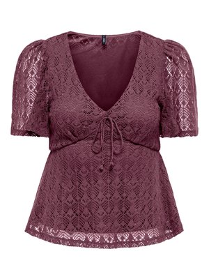 Blusa corta de encaje morado con cuello en V, mangas abullonadas y detalle de lazo frontal en la cintura.