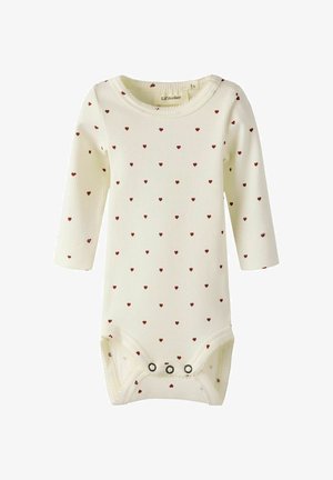 Kreemikas värvi beebihall riietus pika varrukaga, millel on ribakujuline tekstuur ja väikesed punased südamed, mis on riidele laiali jaotatud. Allosas on nööpklapp.