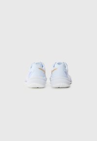 Light blue athletic shoes with smooth synthetic uppers, white soles, and gold accents. Rounded heel and breathable mesh sections.