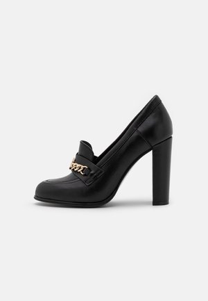 Højhælede pumps - black