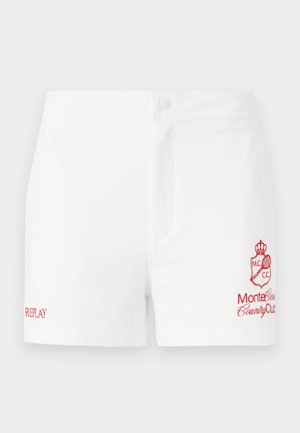 White cotton shorts featuring a front button closure, side pockets, and red embroidered logo of Monte Carlo Country Club and brand name.