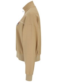 Felpa zip militare marrone chiaro con un motivo a scacchi, colletto alto, polsini a coste e una toppa con logo sul petto. Tessuto morbido.