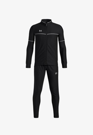 Schwarzer Under Armour Trainingsanzug mit durchgehendem Reißverschluss, weißen Paspelierungen an den Ärmeln und der Brust sowie passenden, schmal zulaufenden Hosen mit Logo auf dem Oberschenkel.