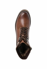Bottine en cuir marron avec un bout arrondi, lacets marron et accents métalliques. Doublure en fourrure visible par l'ouverture supérieure.