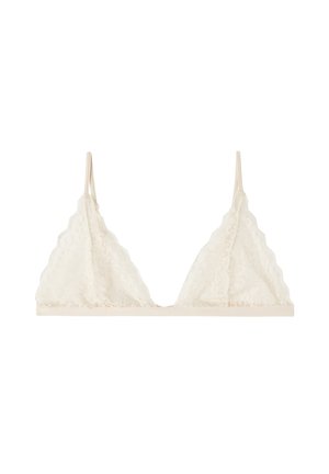 Spitzen-Bralette in sanftem Cremeton, mit dreieckigen Cups und gewellten Kanten sowie dünnen, verstellbaren Trägern. Glatter Unterband.
