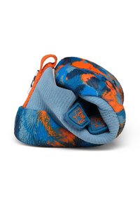 Flexible blue and orange toddler shoe rolled up, featuring textured sole and cartoon animal icons on the inner straps.