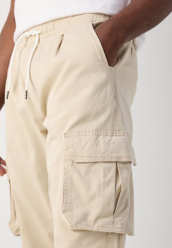 OVERDYED PANTS - Cargo trousers - stone3