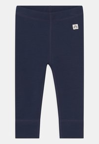 Leggings bleu marine en tissu extensible, avec des coutures texturées, un design ajusté et un petit patch décoratif avec un détail arc-en-ciel.
