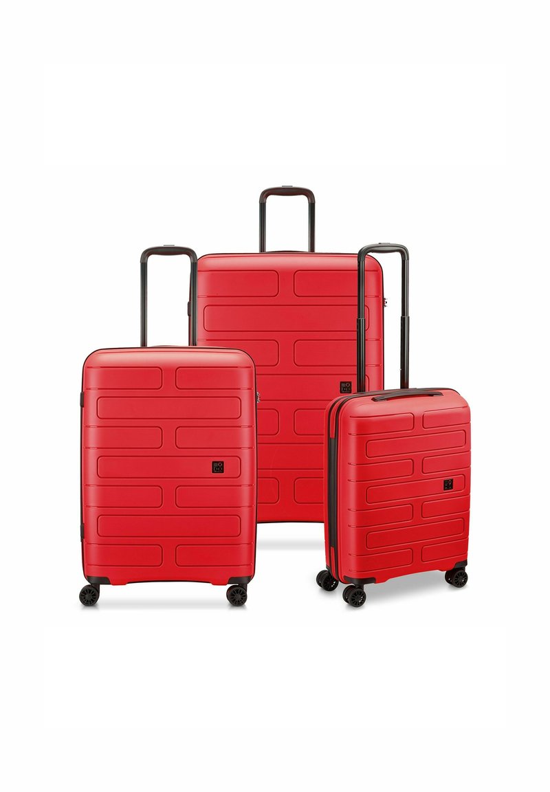 Three red hard-shell suitcases of varying sizes feature a rectangular design with horizontal indentations, black retractable handles, and rolling wheels.