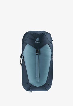 Der Deuter-Rucksack zeichnet sich durch ein zweiseitiges Design mit dunklem Blau und hellblauem Stoff, einem oberen Kordelzugverschluss und verstellbaren Trägern aus.