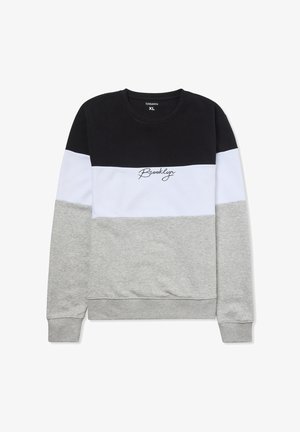 Felpa con blocchi di colore nero, bianco e grigio, con scollatura rotonda, maniche lunghe e la scritta "Brooklyn" ricamata in corsivo sul petto.