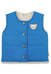 Gilet imbottito blu con una fodera di peluche color crema, dotato di un patch a forma di orso sul petto e bottoni a pressione argentati lungo la parte anteriore.