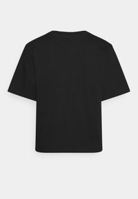 Black cotton T-shirt with short sleeves, V-neck back design, and a relaxed fit. Smooth texture and no visible patterns or accents.