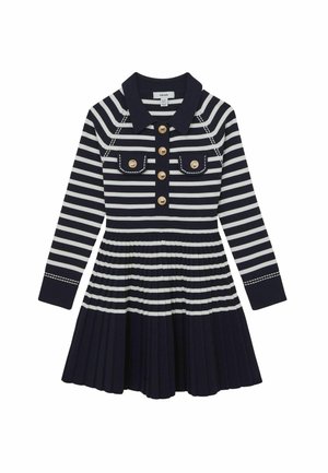 Vestido a rayas en azul marino y blanco con cuello, botones y falda plisada. Presenta dos bolsillos en el pecho y mangas largas.