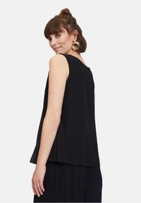 Cartoon MIT PLISSEE - Blus - schwarz